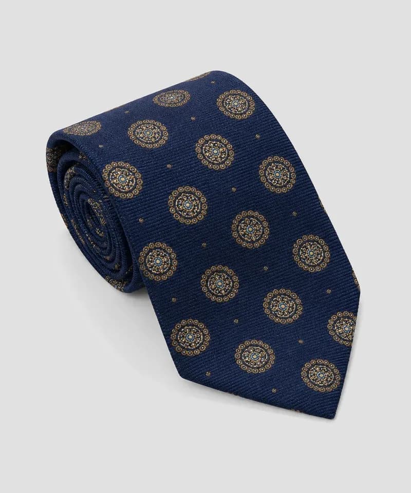 Corbata azul marino con medallones dorados — Corbatas